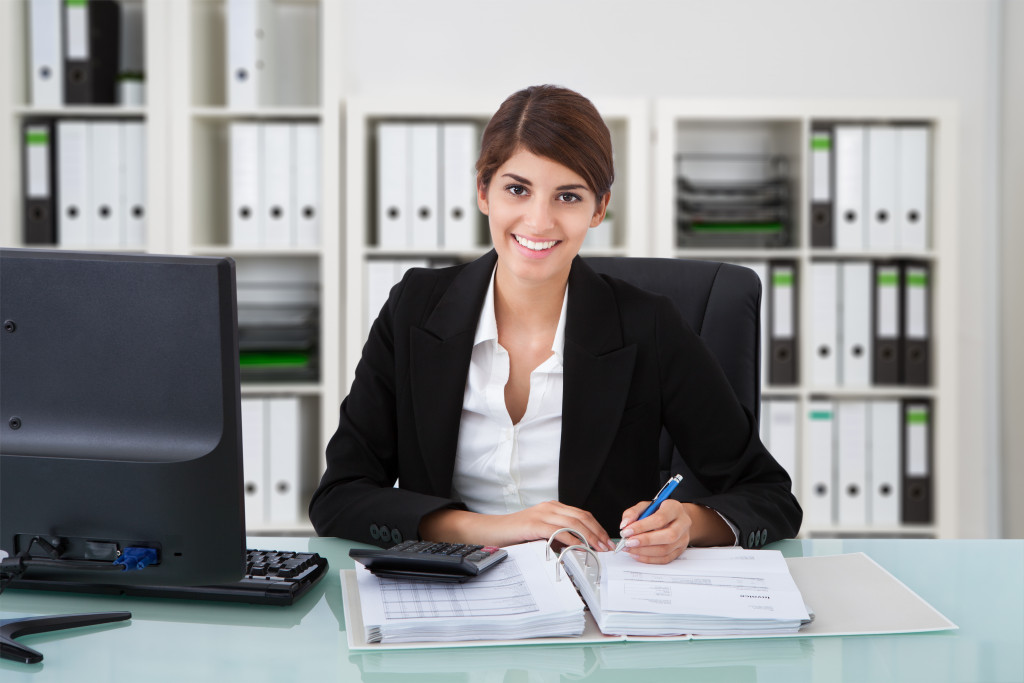 An advisor working on her desk